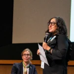 Shalini Bhatia, Stanford University, outgoing UNICON Board Chair, presenting the 2026 year in review
