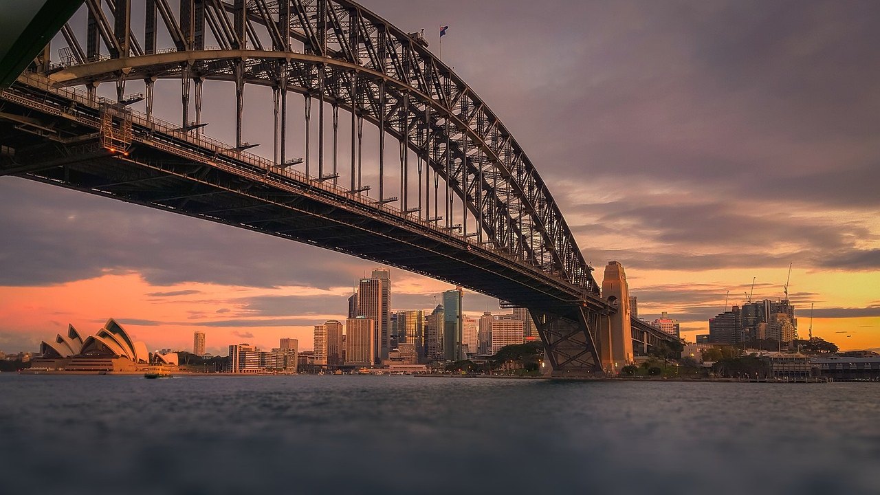 Sydney Harbour Bridge and Opera House at sunset