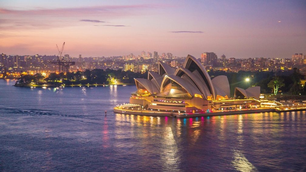 Sydney Opera House and harbour at dusk